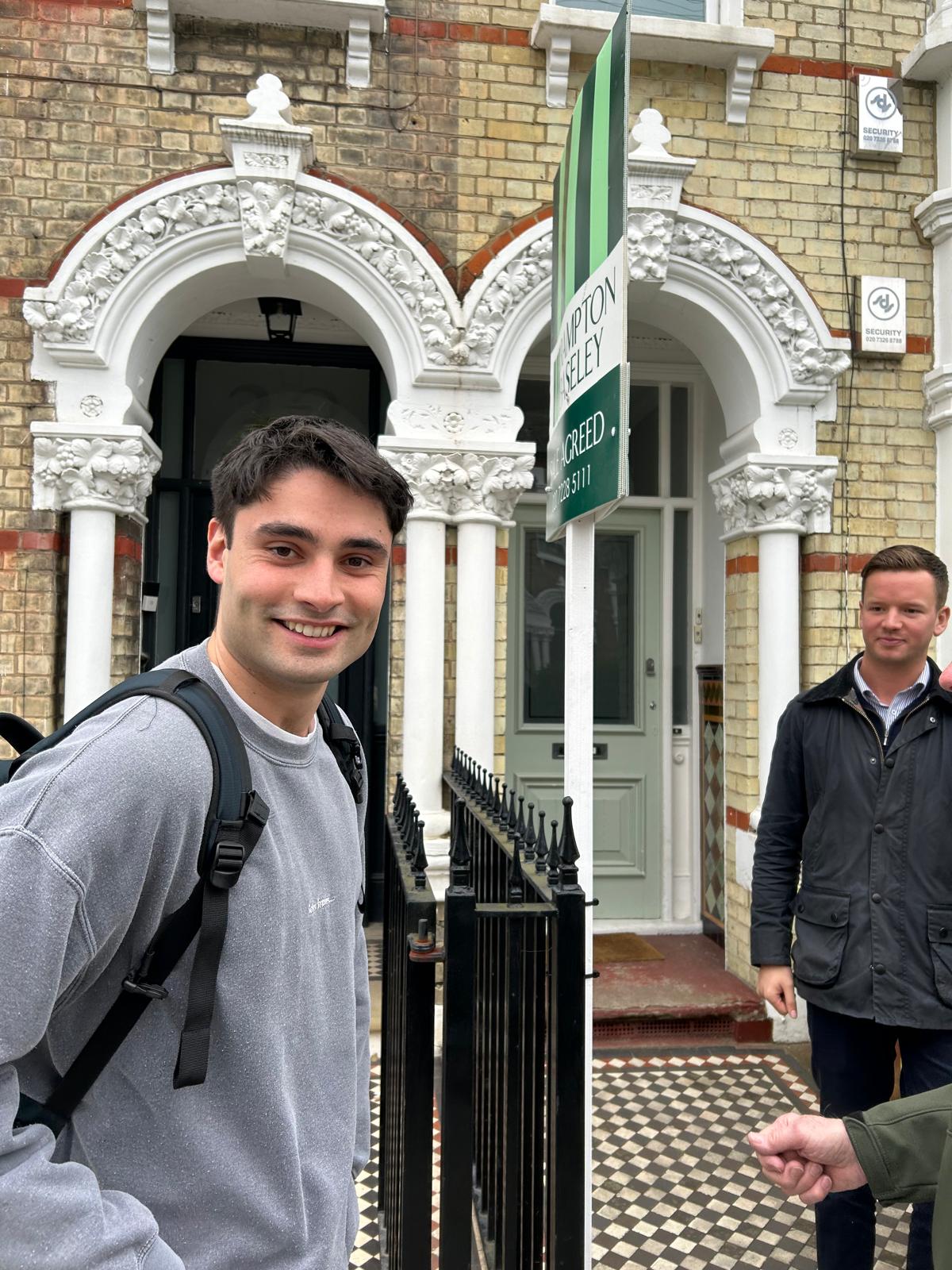 A buyer collecting the keys to a property they secured