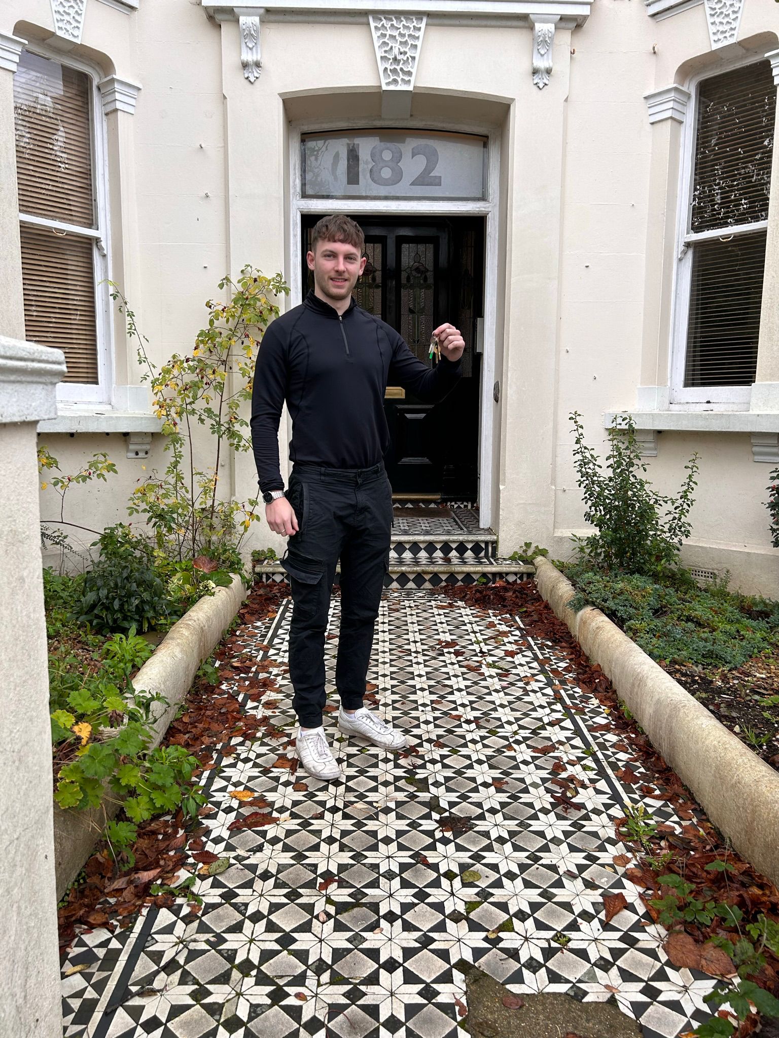 A buyer collecting the keys to a property they secured